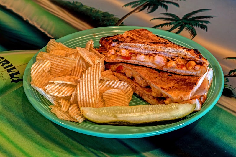 Food and interior photo 2 at Grills Seafood Deck & Tiki Bar in Cape Canaveral