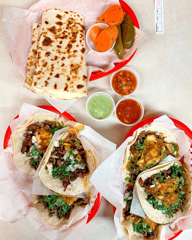 Food and interior photo 1 at Taquería El Farolito in San Francisco