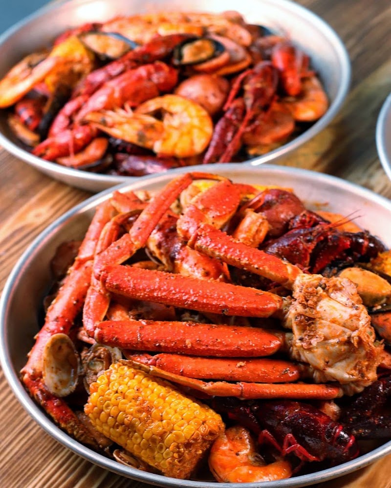Food and interior photo 1 at Hook & Reel Cajun Seafood & Bar in Overland Park