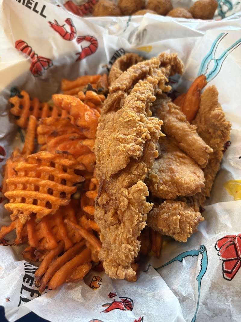 Food and interior photo 5 at Hook & Reel Cajun Seafood & Bar in Overland Park