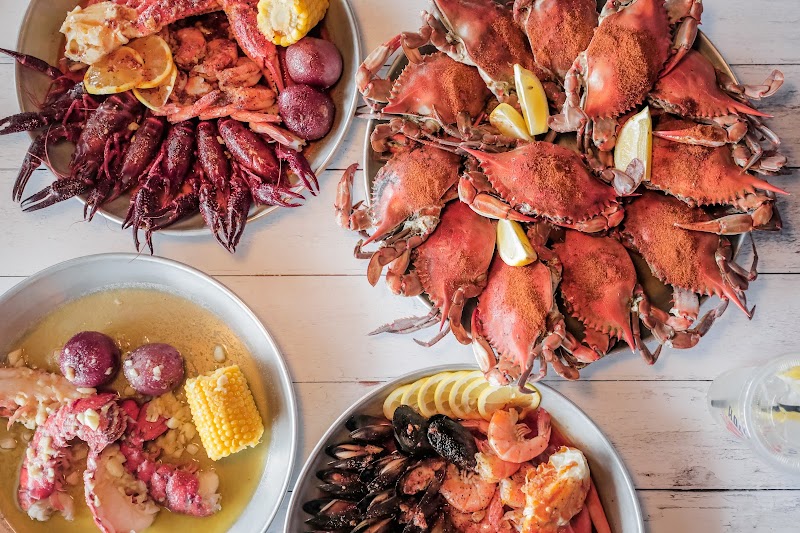 Food and interior photo 1 at Hook & Reel Cajun Seafood & Bar in Kearny