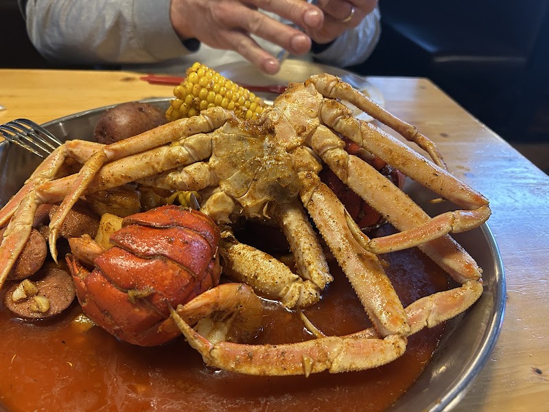 Food and interior photo 2 at Hook & Reel Cajun Seafood & Bar in Wichita