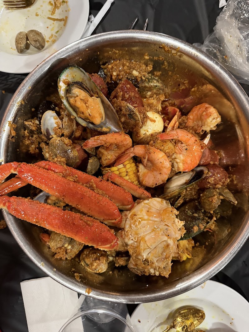Food and interior photo 4 at Inferno Seafood Boil in Anchorage