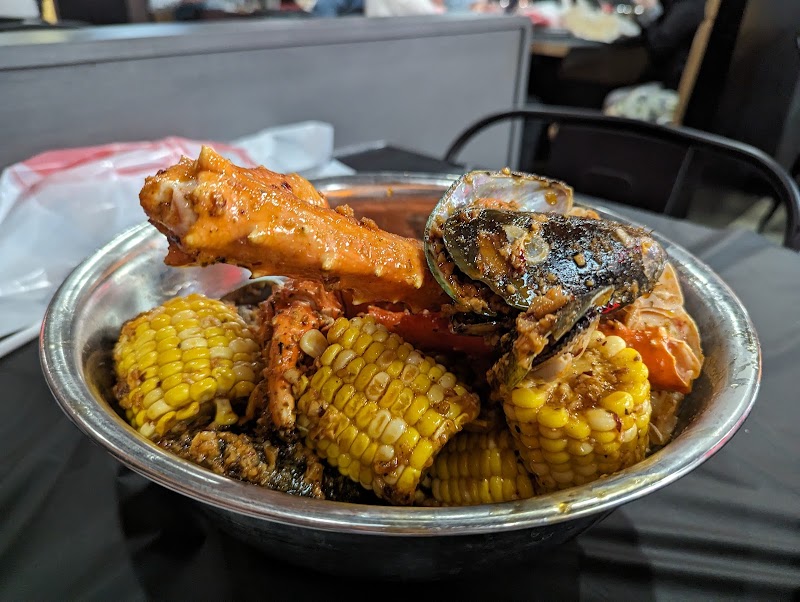 Food and interior photo 1 at Inferno Seafood Boil in Anchorage