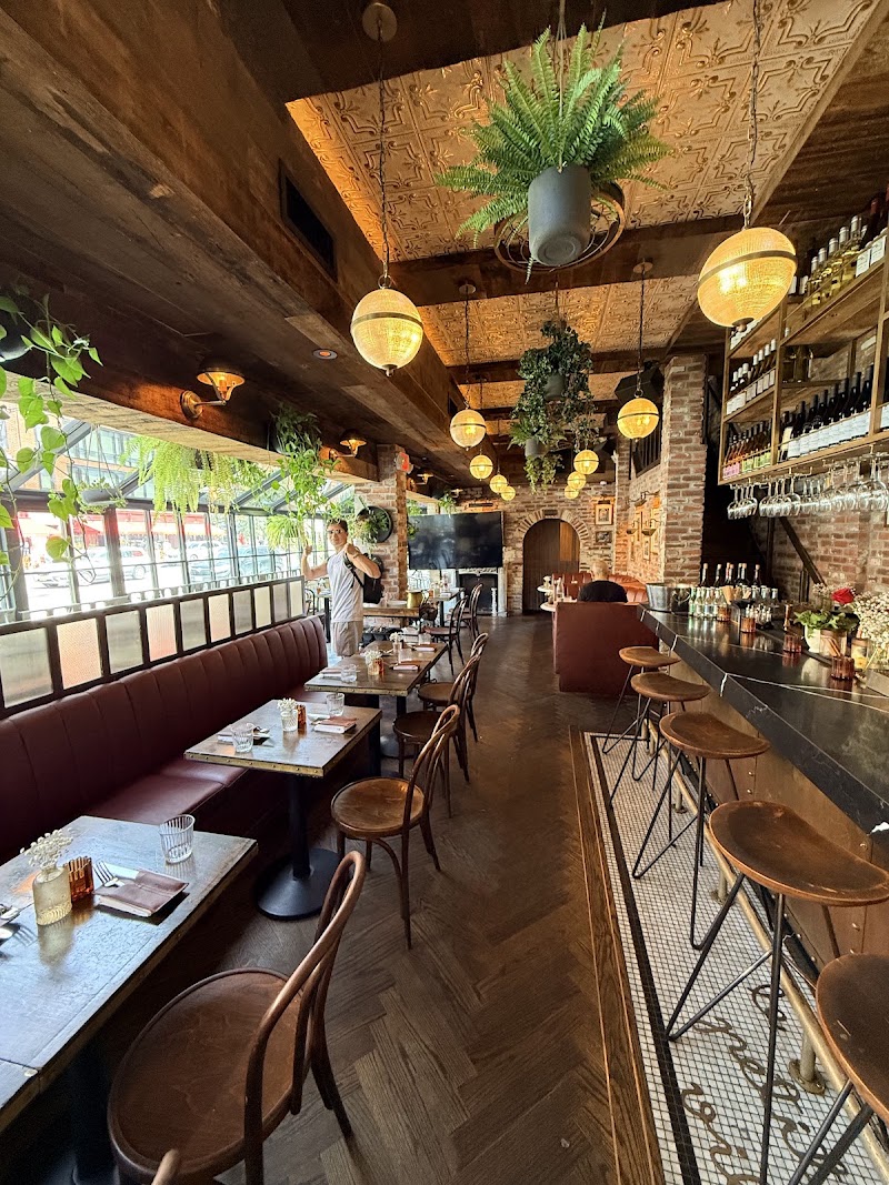 Food and interior photo 1 at Le Petit Village in New York