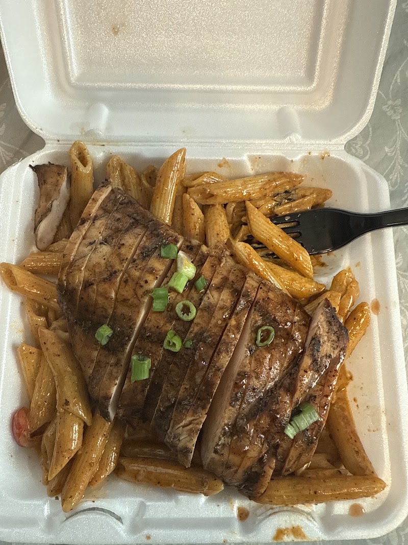 Food and interior photo 4 at Ziggy's Caribbean Cuisine in Minot