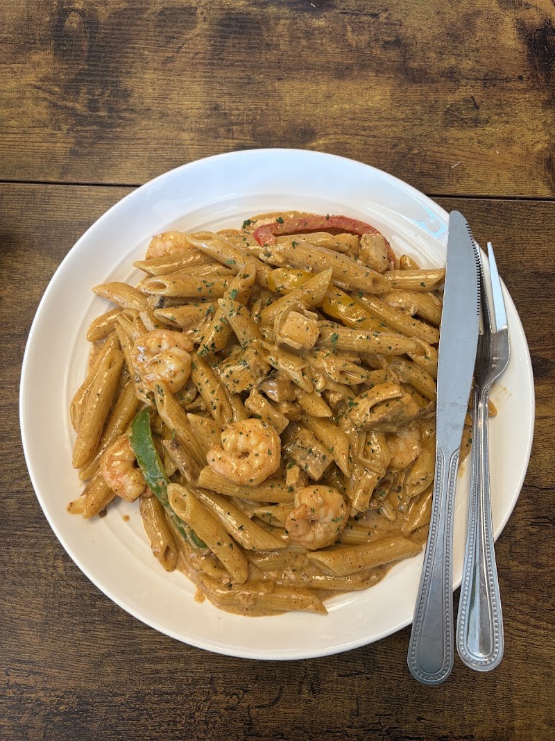 Food and interior photo 5 at Ziggy's Caribbean Cuisine in Minot
