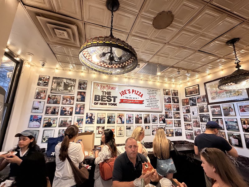Food and interior photo 2 at Joe's Pizza Broadway in New York