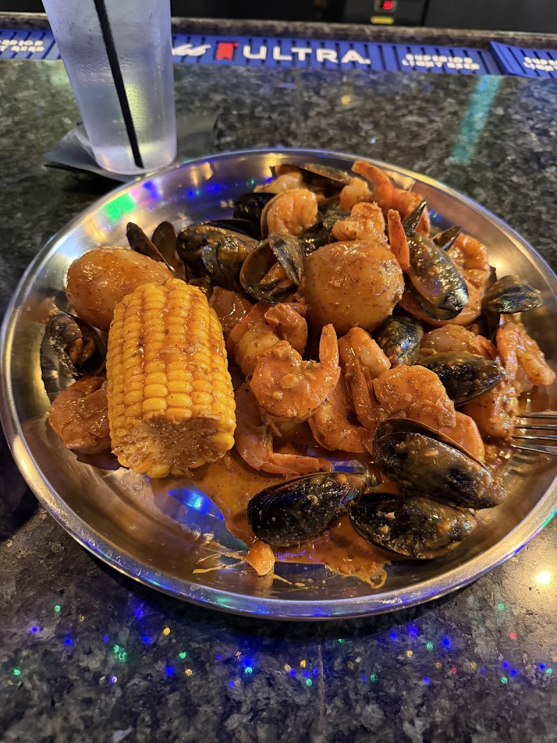 Food and interior photo 2 at Hook & Reel Cajun Seafood & Bar in West Valley City
